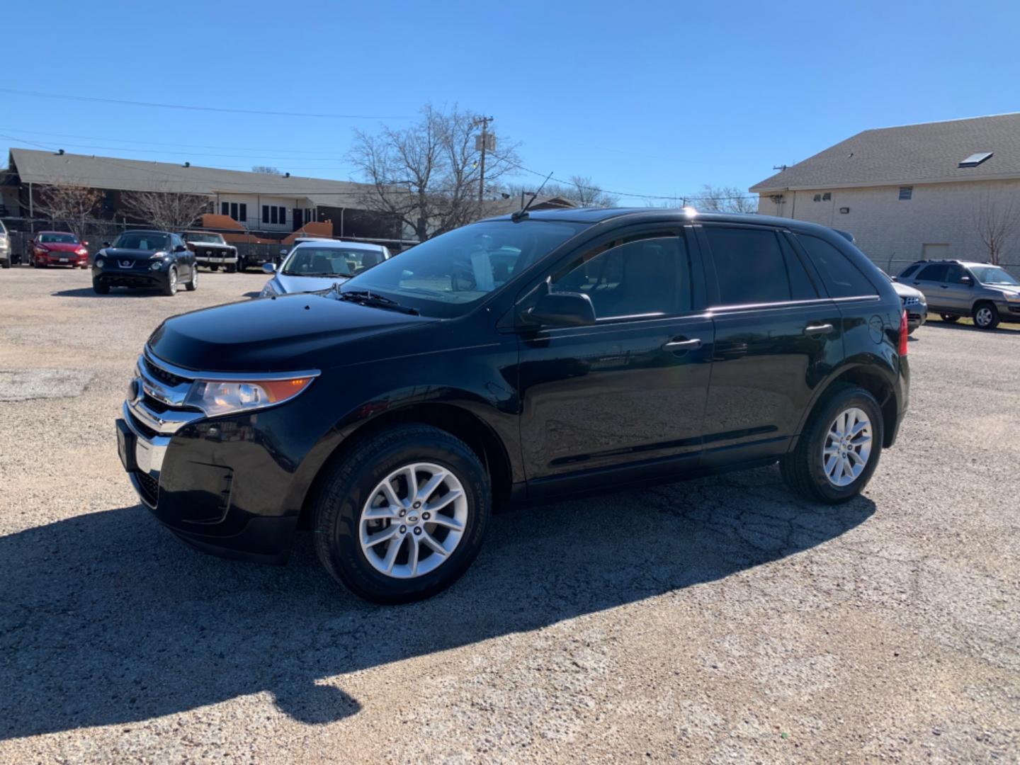 2013 Black /Tan Ford Edge (2FMDK3GC5DB) with an V6 - 3.5L 3496cc 213ci GAS MFI vin C - 4 valve DOHC engine, AUTOMATIC transmission, located at 1830 North Belt Line Road, Irving, TX, 75061, (469) 524-0199, 32.834373, -96.993584 - Photo#4